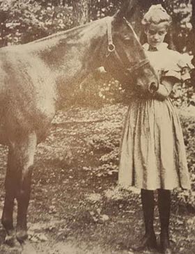 Young Eleanor Roosevelt with a horse; she was a skilled and lifelong rider. (FDRL)
