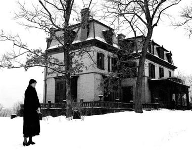 In later years, Eleanor Roosevelt stands outside the Tivoli, New York home of her maternal grandmother, where she spent her adolescence. (FDRL)