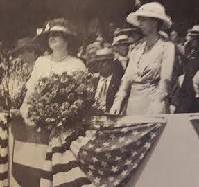 With the Democratic presidential candidate’s wife Margareta Cox, Eleanor Roosevelt reviews a 1920 campaign parade. (International News Photo)