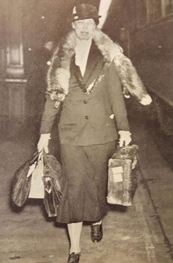 Mrs. Roosevelt, in perpetual motion, carrying her worn suitcase, her fur-piece swinging from her neck as she strided through train stations and airports, became a familiar persona to Americans in the 1930s and 1940s. (New York Daily News)