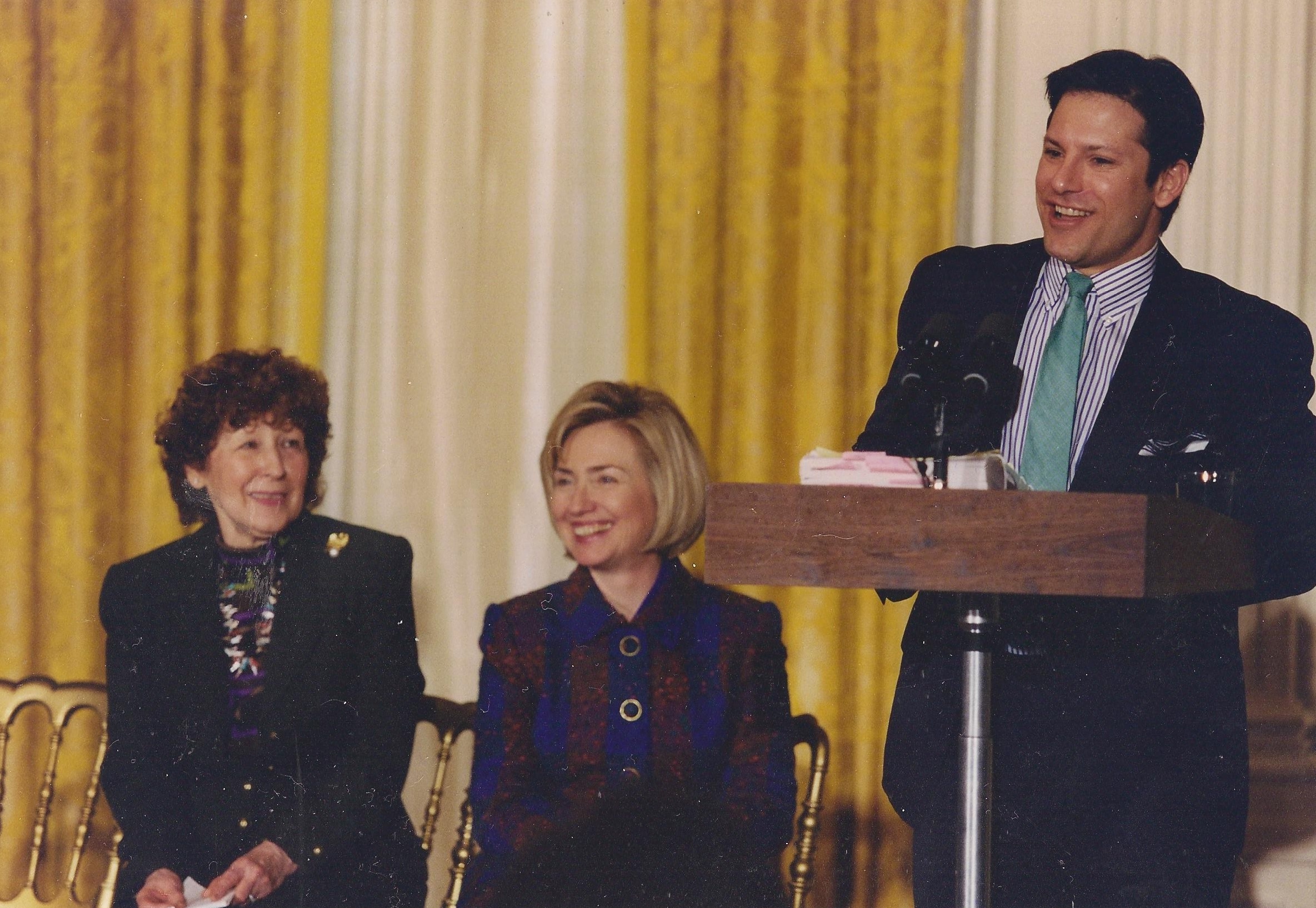 Hillary Clinton with Mary Regula, founder of the National First Ladies' Library at the East Room launch of the NFLL website, its historian Carl Anthony at the lectern. (WJCPL)