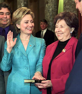 While still the incumbent First Lady, Hillary Clinton took the oath of office as United States Senator in January 1, 2001, her mother holding the Bible during the Senate ceremony. (Getty)