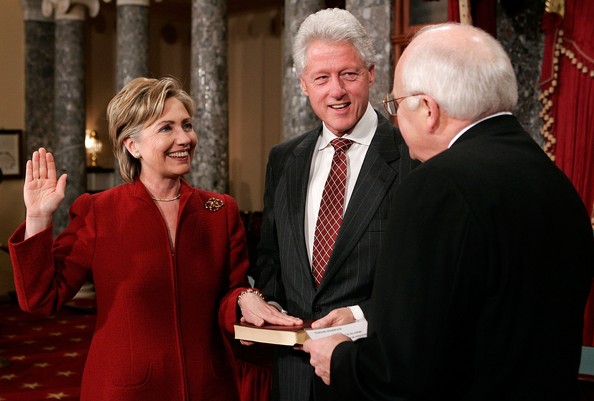 Bill Clinton holds the Bible on which Hillary Clinton took the oath for her second term as Senator. Less than three weeks later, she filed to declare her candidacy for the presidency in 2008. (Getty)