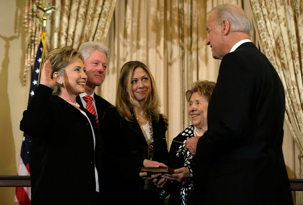 Hillary Clinton was sworn in as Secretary of State with her husband, daughter and mother holding the Bible as recently-inaugurated Vice President Joseph Biden swore her in. (Getty)