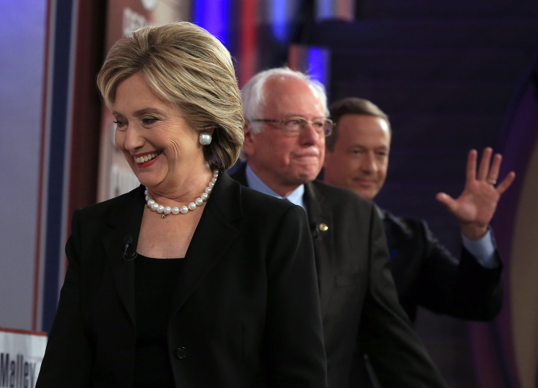 Hillary Clinton leaving a debate stage with rivals for the 2016 Democratic presidential convention, U.S. Senator Bernie Sanders and former Maryland governor Martin O'Malley. (nola.com)