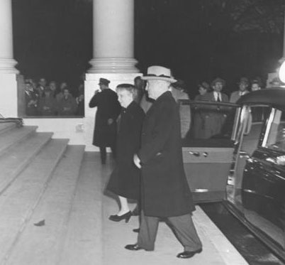 Harry and Bess Truman on the White House North Portico on the night they returned to live in the renovated mansion. (National Archives)