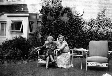Bess Truman relaxing in the Blair House garden with her daughter. (HSTL)